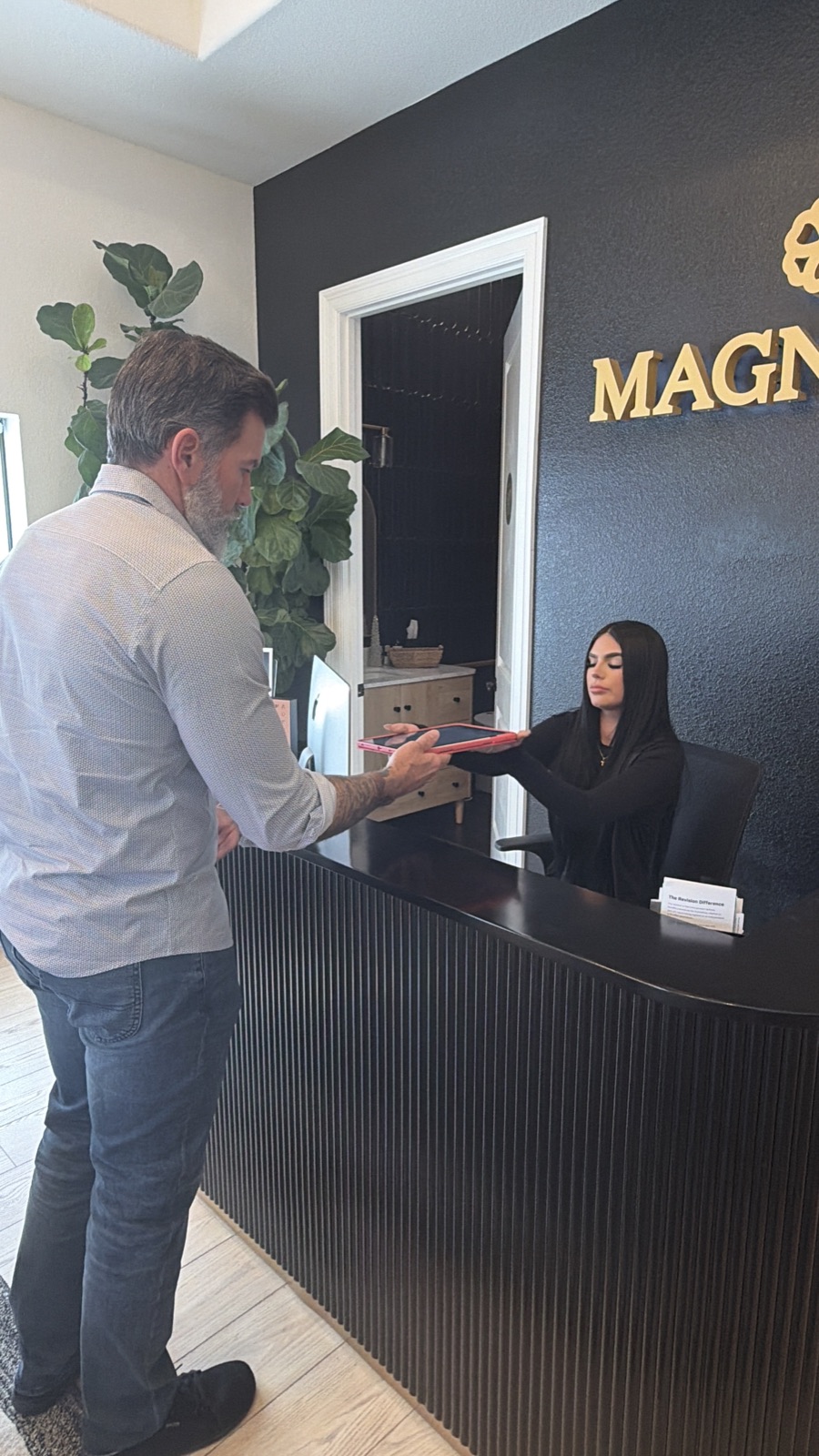 Patient checking in at the front desk